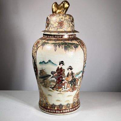 SATSUMA LIDDED VASE | Large lidded Japanese Satsuma vase decorated with various figures, flowers, and gilthighlights. - h. 25 x dia. 12 in

