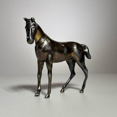 Silver or Silver Plated horse | Small silver plated horse statue, marked on bottom with maker's mark and numbered 2285. - h. 4.5 x...