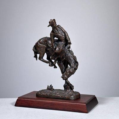 Remington Outlaw Bronze | The Outlaw official issue of the Frederic Remington Art Museum. 1988 The Franklin Mint. Wood platform included,...