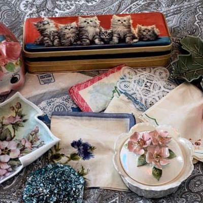 Collectibles piggy bank trinket boxes and handkerchiefs