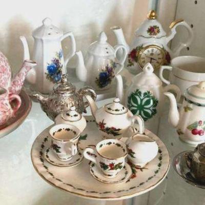 A collection of miniature tea cups