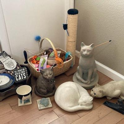 Ceramic and cement cat statues