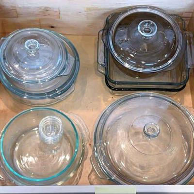 Glass baking dishes lidded some without