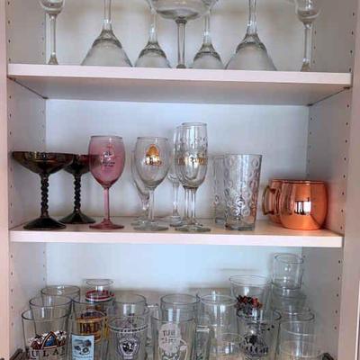A large number of drinking glasses