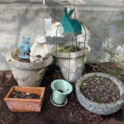 Cat yard art and cement planters