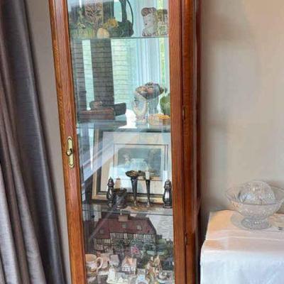 Curio cabinet with fixed glass shelves