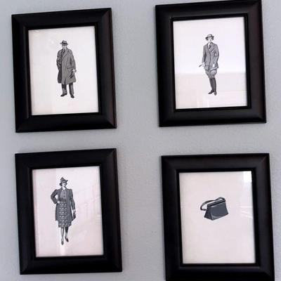 Four fashion prints in frames