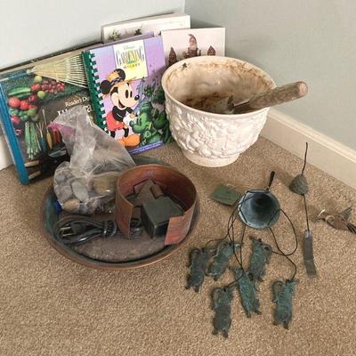 Brass cat wind chime gardening books