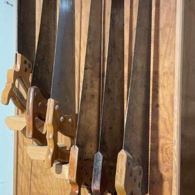 A collection of vintage hand saws