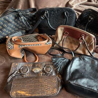 A grouping of handbags