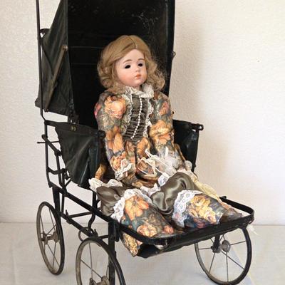 Porcelain Victorian Doll In A Victorian Antique Buggy