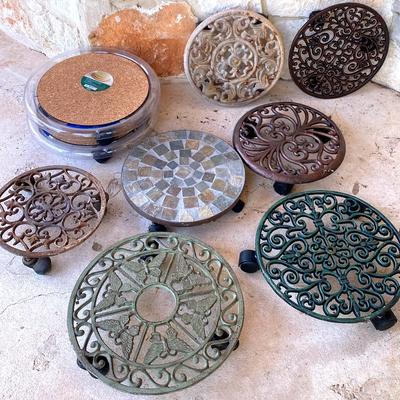 Lot of assorted plant caddy’s with wheels 