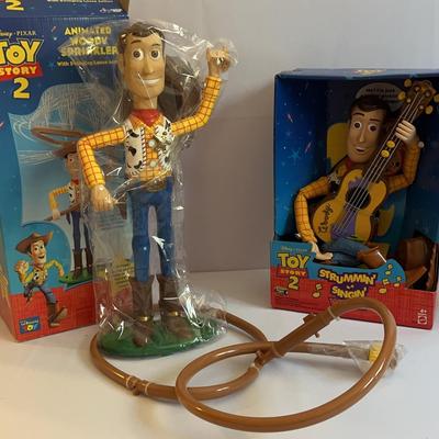 Toy Story 2 Animated Woody Sprinkler & Strumming Singin Woody