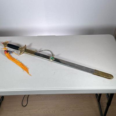 Chinese Sword with Jade | Sword with dragon and ying yang embossing, with dragon carving on the cover along with a jade cabochon, having...