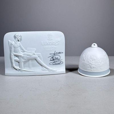 (2pc) Lladro Bell & Plaque | Working Winter Bell with blue ribbon and Lladro Collector’s Society piece with signatures. Bell comes in...