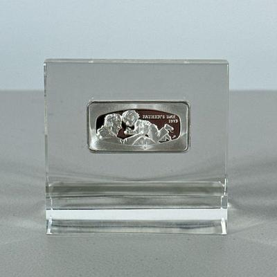 Sterling Fathers Day Bar | 1973, with fineness mark, set in an acrylic display stand; bar approx. w. 1.75 in., marked on the bottom “1000...