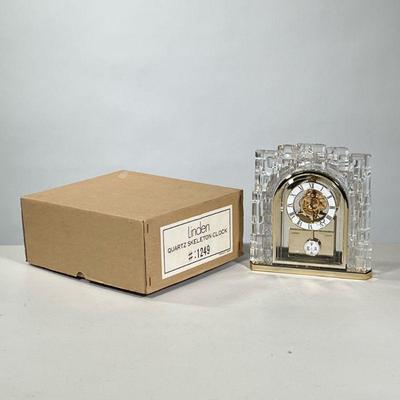 [NIB] LINDEN QUARTZ SKELETON CLOCK | New in box Linden crystal cased quartz skeleton clock. - h. 10.26 x w. 9 x d. 4 in (box)

