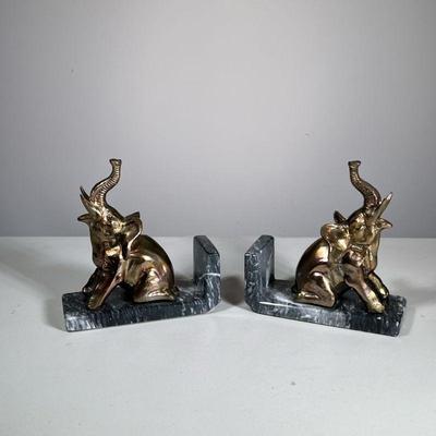 BRASS & MARBLE ELEPHANT BOOKENDS | Brass elephant figurine bookends on a marble base, no apparent markings. - h. 7 x w. 3 x l. 7.5 in