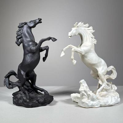 (2pc) Porcelain Horses | One black and one white, Battling Stallions by Edward D. Hart issued by the Franklin Mint. - h. 10.5 x w. 5 x l....