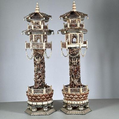 PAIR LARGE CARVED BONE JAPANESE PAGODA TOWERS | Monumental carved and stained bone pagoda towers with intricate dragon columns mounted on...