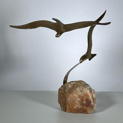 Brass Seagulls | A brass statue of two birds in flight mounted on piece of quartz. - h. 17 x w. 17 x d. 9 in