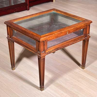 TURKISH TEA/COFFEE SET | Glass display case side table with fall front door, over tapering square legs terminating in brass-capped feet....