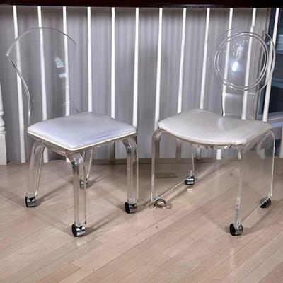(2pc) Mid-Century Acrylic Chairs | Two similar lucite chairs on casters. - h. 33.5 x w. 18 x d. 18 in

