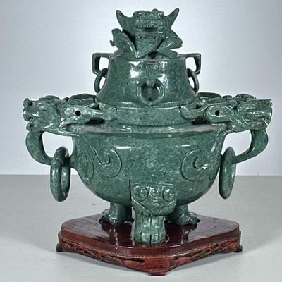 Chinese Carved Censer | Soapstone or other green stone, with reticulated ring turnings, on conforming wood stand. - h. 10.5 x l. 10.5 x...