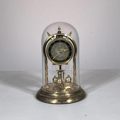 SCHATZ GLASS DOME CLOCK | Schatz brass & glass dome clock made in Germany. - h. 9 x dia. 6 in