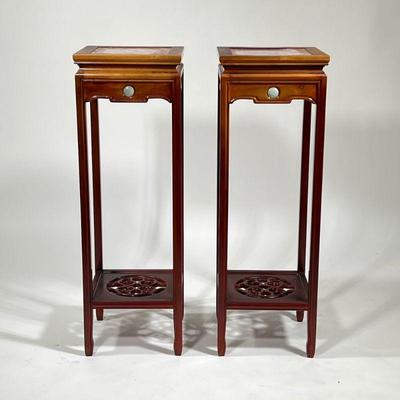 Pair Chinese Display Stands | Carved wood pedestal display stands with inset stone tops and stone cabochons, over a lower open shelf with...