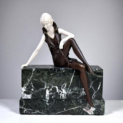 After Chiparus Bronze | After Demetre Chiparus: Art Deco style figure of a girl on a wall, bonze and carved bone on a marble pedestal. -...