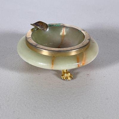 CARVED STONE ASHTRAY | Carved onyx ashtray on three gilt metal claw feet. - h. 1.5 x dia. 3 in

