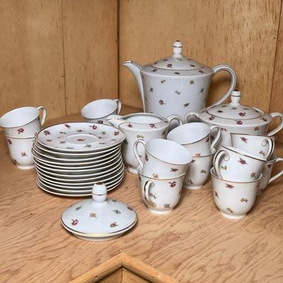 HAVILAND LIMOGES TEA SET | Ch. Field Haviland Limoges porcelain tea service for twelve adorned with a delicate floral pattern of small...