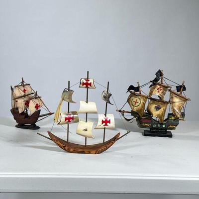 (3pc) Small Model Ships | Three colonial model ships, including Santa Maria and a ship with bone flags decorated with red crosses. - h....
