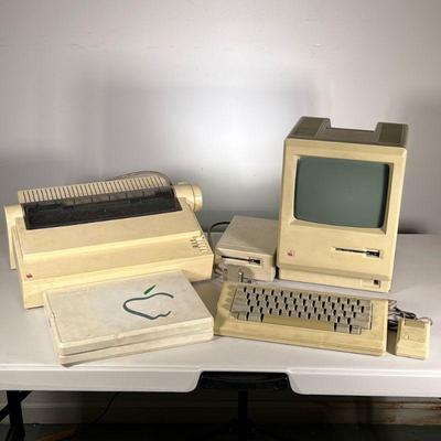 Original Mac Computer | Includes Macintosh computer with screen, set of discs and floppy disc reader, keyboard and power chords in...