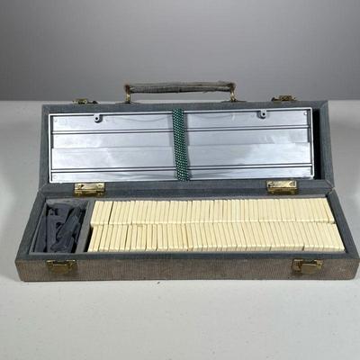 Rummikub Set | Gray corduroy carrying case. - h. 5 x w. 3.5 x l. 14 in

