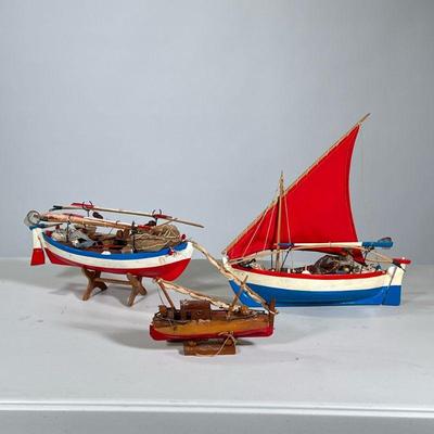 (3pc) Painted Model Sailboats | Red white and blue painted ships, including one signed and dated 79. - h. 12 x w. 4 x l. 12 in (largest)
