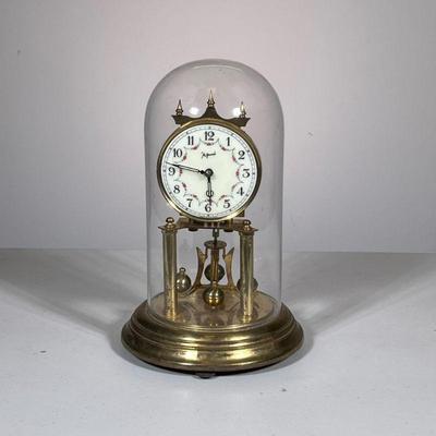 JOHN WANAMAKER GLASS DOME CLOCK | John Wanamaker brass & glass dome clock with painted enamel face, made in Germany. - h. 12 x dia. 8...