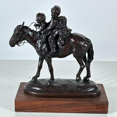 Anna Dwyer (1927-2018), Bronze | Three children on a hors. Patinated bronze affixed to a wood stand - h. 8.75 x w. 3.5 x l. 7.75 in (with...