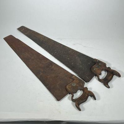 (2pc) PAIR ANTIQUE SAWS WITH FANCY CARVED HANDLES | Including one with broad teeth, engraved T. M. And another with fine teeth. - l. 33 in