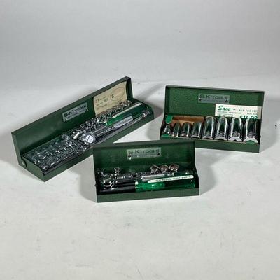 (3pc) S-K TOOLS SOCKET DRIVE SETS | Each in a green enameled box, including a 21-piece 1/4" drive set. - l. 10.5 in (largest box)

