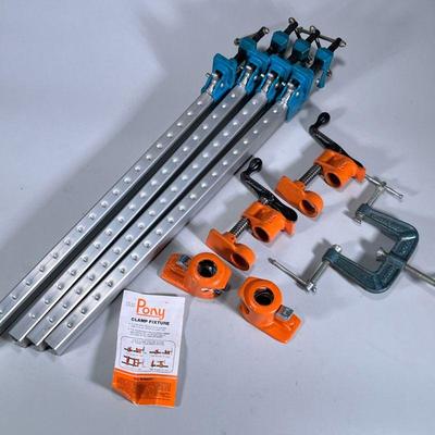 (7pc) MIXED CLAMPS & FIXTURES | Including: 4 adjustable bar clamps on 1 1/4” bars. 2 “Pony” Pipe clamp fixtures . Globe Master 3...