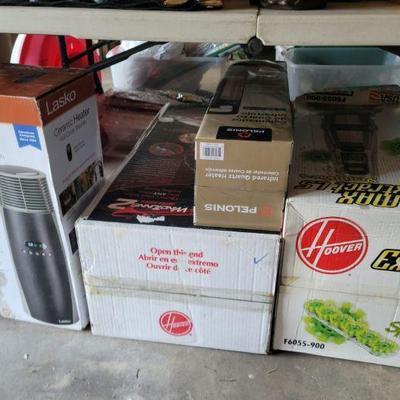 New in box heaters, vacuums