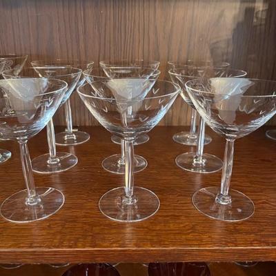 Lots of sets of vintage and modern barware and wine glasses
