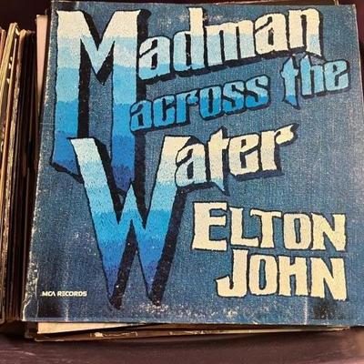 Vintage vinyl records—mostly 70s and 80s—talking Heads, Bruce Springsteen, Bob Dylan, Cheap Trick, The Clash, Roxy Music, Prince, Little...