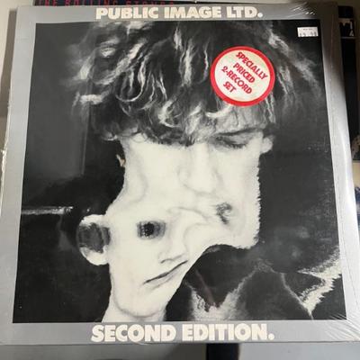 Vintage vinyl records—mostly 70s and 80s—talking Heads, Bruce Springsteen, Bob Dylan, Cheap Trick, The Clash, Roxy Music, Prince, Little...