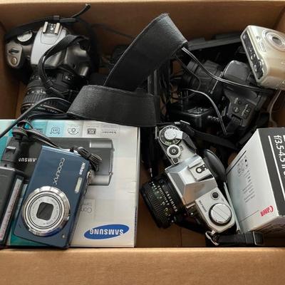 lots of cameras, Canon and Nikon