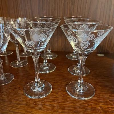Lots of sets of vintage and modern barware and wine glasses