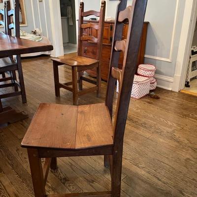 Set of 8 solid wood, ladder backed dining chairs