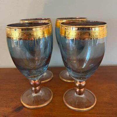 Lots of sets of vintage and modern barware and wine glasses